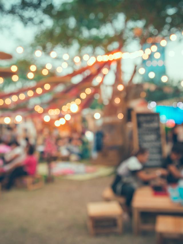 Abstract blur people in night festival city park bokeh background - vintage tone